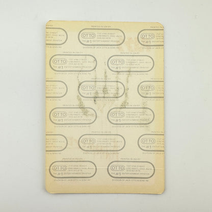 Backside of pass showing intact paper backing and mint condition. 