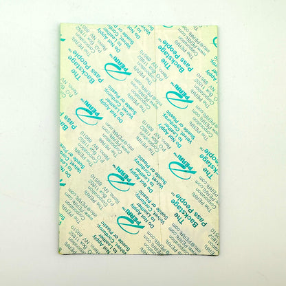 Backside of pass showing intact paper backing and mint condition. 