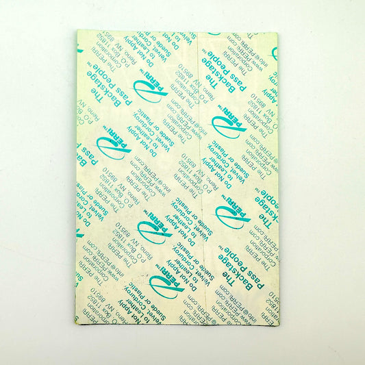 Backside of pass showing intact paper backing and mint condition. 