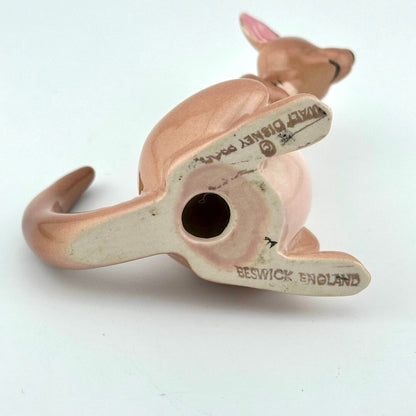 A vintage ceramic Disney kangaroo figurine shown from underneath on a plain white background. 