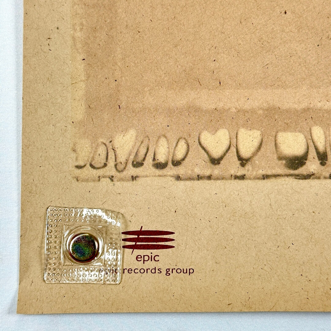 Bottom left corner with some edge wear.