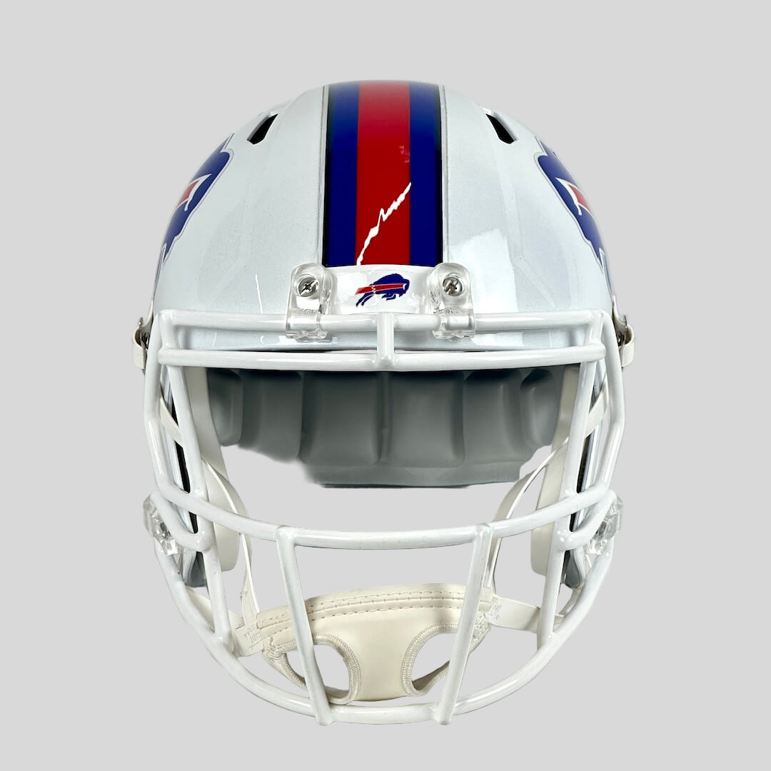 Football helmet with a blue and red stripe on a gray background