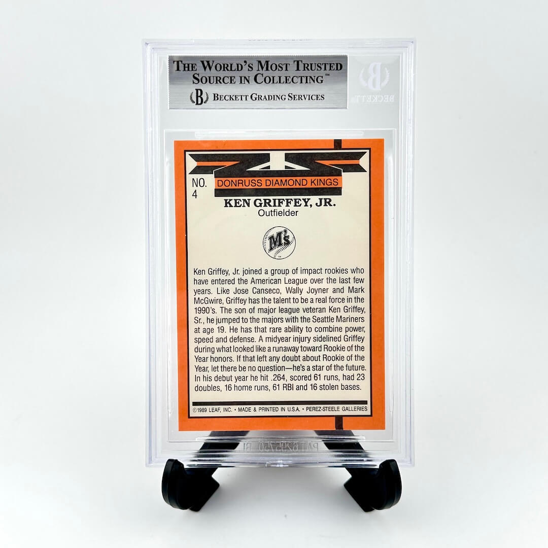 Trading card of Ken Griffey Jr. in a protective holder with Beckett Grading Services logo.