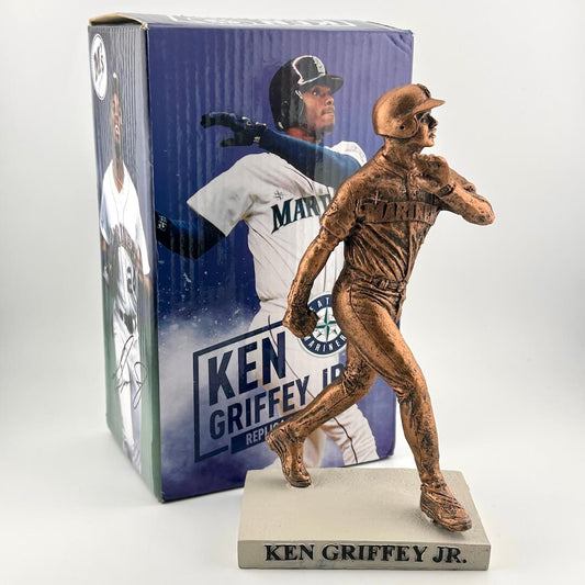 Replica bronze statue of Ken Griffey Jr. with packaging on white background. 