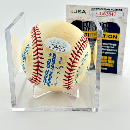 Signed baseball in clear display cube with JSA sticker and certificate card. 