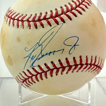 Close up of blue pen signature across sweet spot. 
