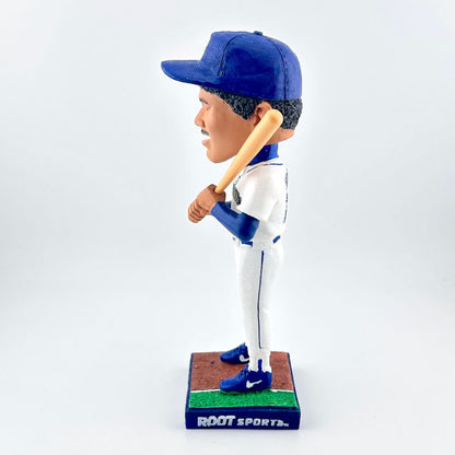 Baseball bobblehead figure holding a bat on a white background