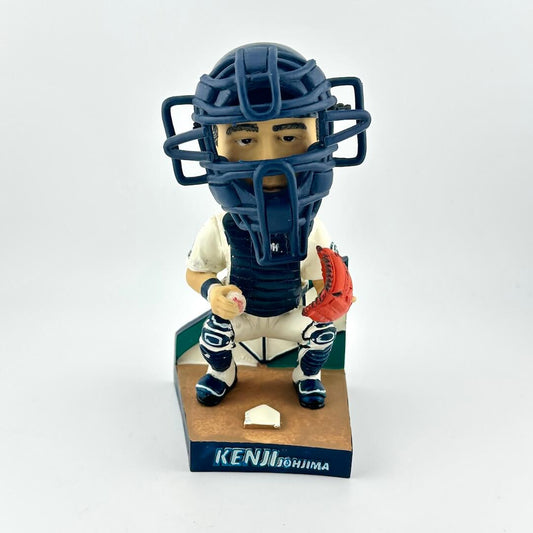 Bobblehead figure of a baseball player in catcher's gear on a white background