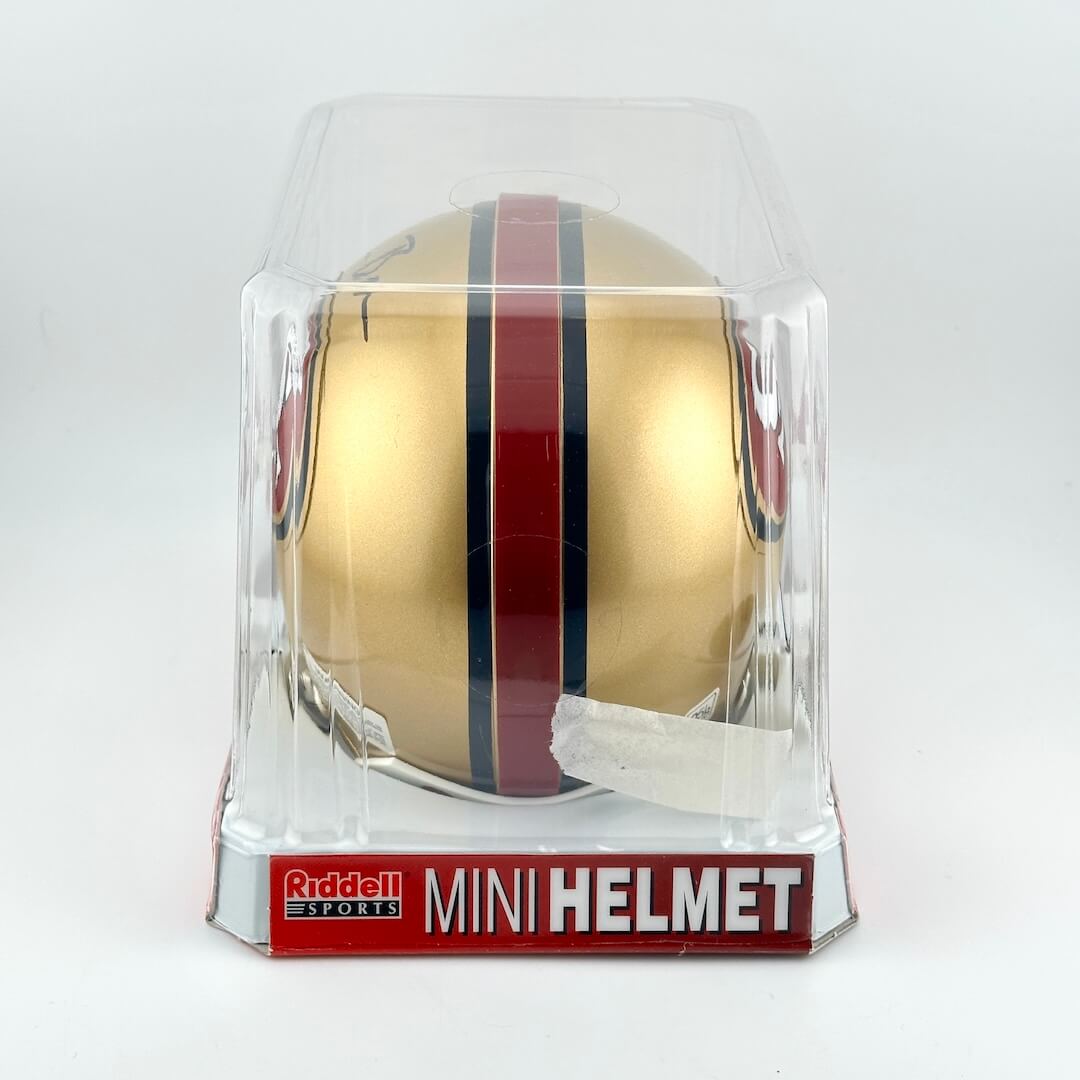 Riddell mini football helmet in clear packaging on a white background
