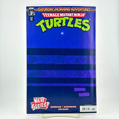 Comic book cover of Teenage Mutant Ninja Turtles with blue and purple design