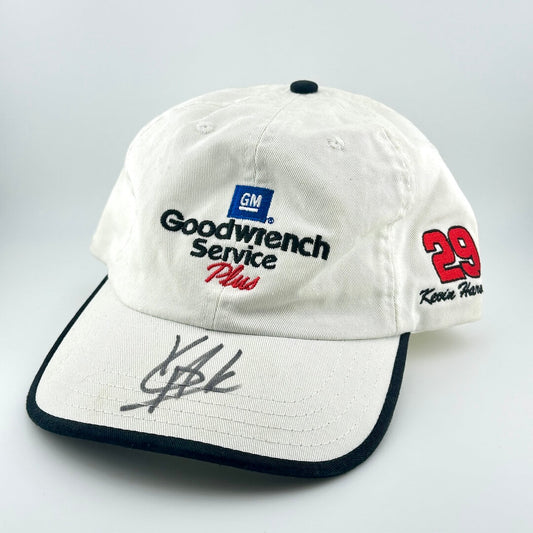 White cap with Goodwrench Service Plus and GM logos on a light gray background