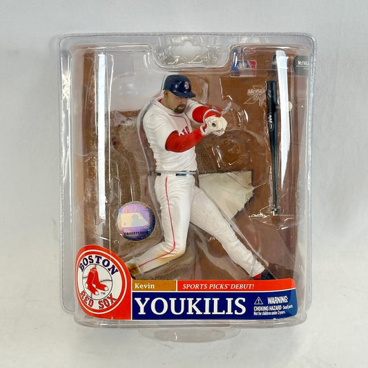 Baseball player action figure in packaging with Boston Red Sox branding