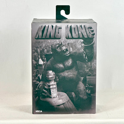 Boxed toy figure of King Kong with NECA branding on a white background