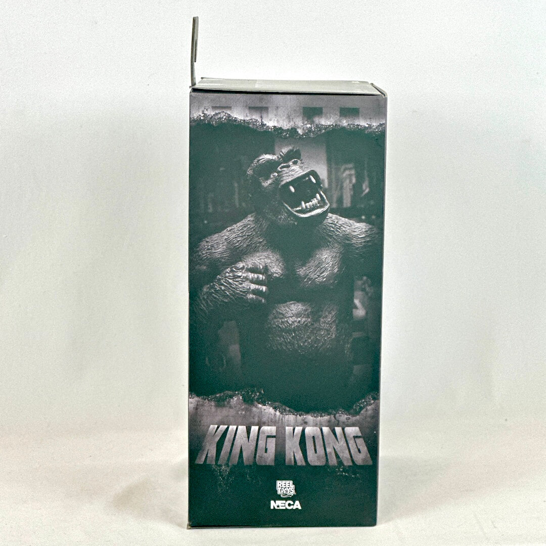 Box featuring a depiction of King Kong with the brand 'NECA' on a white background