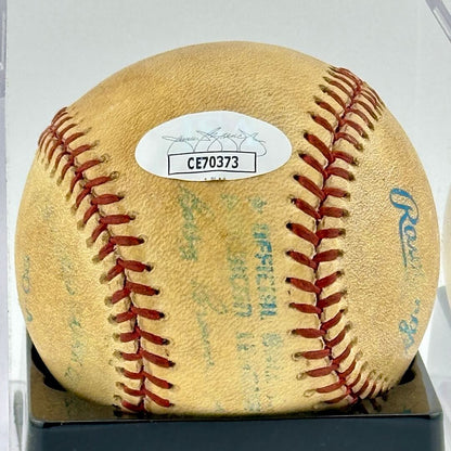 Close up of JSA authentication sticker next to MLB ball information stamp.
