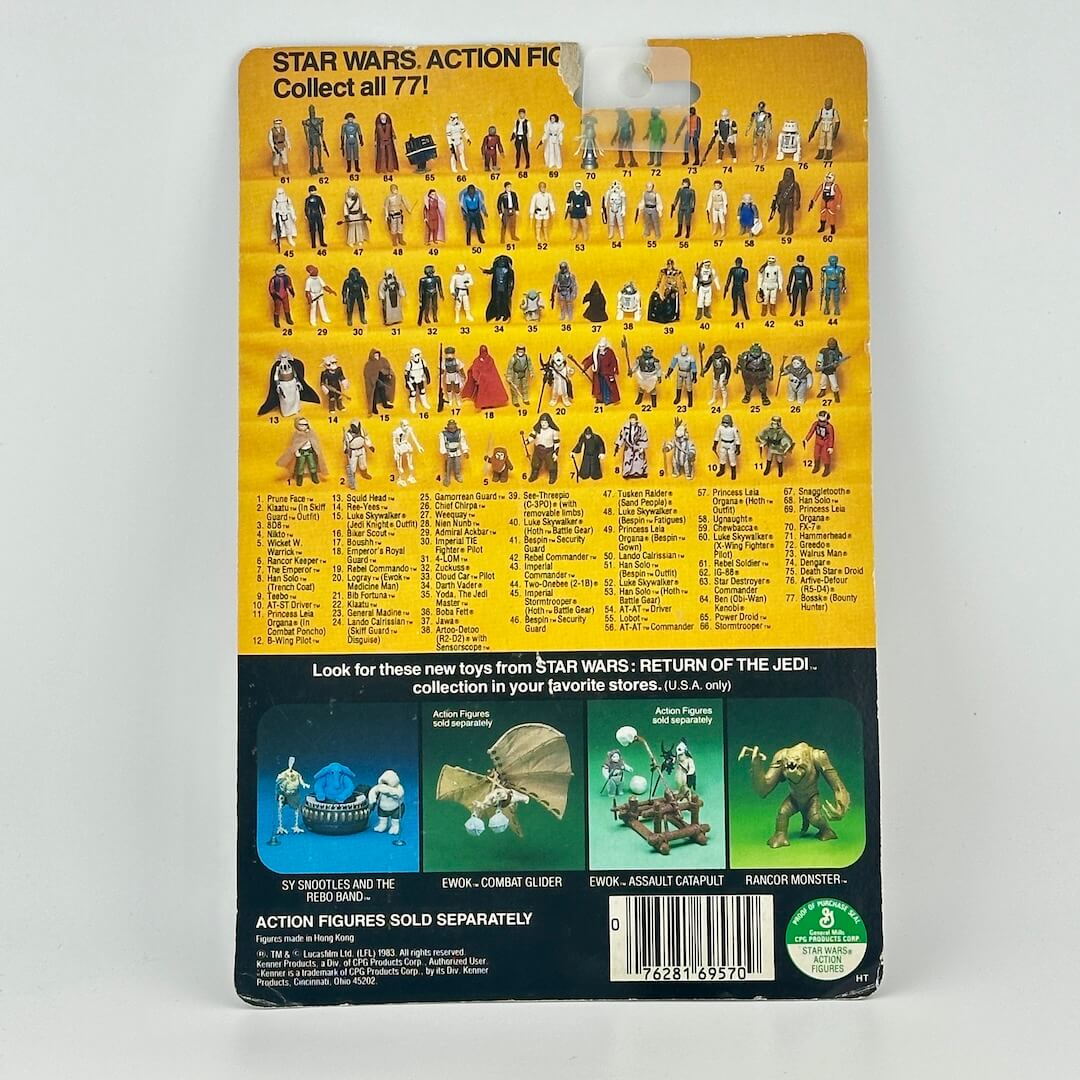 Back of a Star Wars action figure packaging with character illustrations and text.