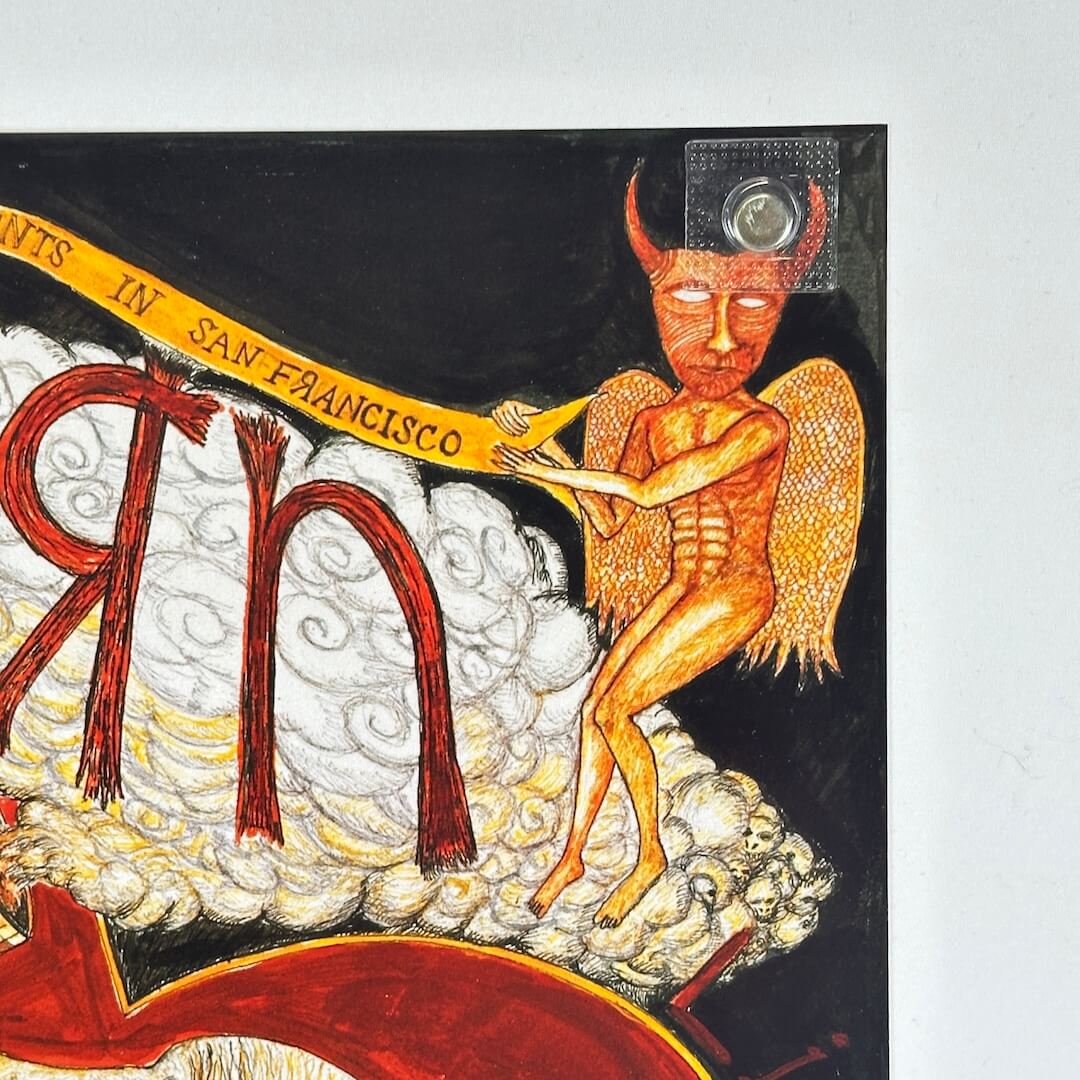Top right corner of poster showing devil with wings holding banner in cloud. Crisp corner, no edge wear.