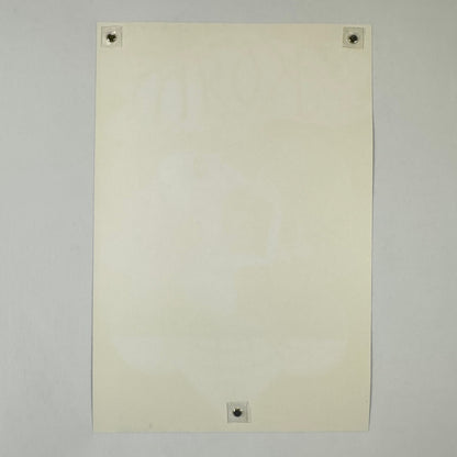 Backside of white poster showing no damage to edges, corners or face. 
