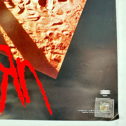 Bottom right corner of poster with copyright information and creased corner. 