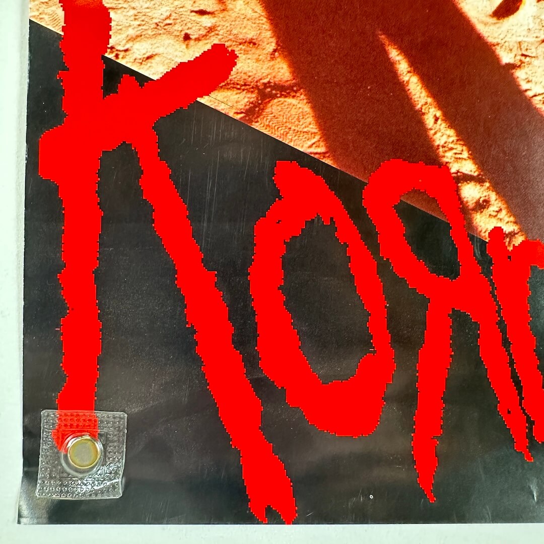 bottom left corner of poster with slight wear to edge. 