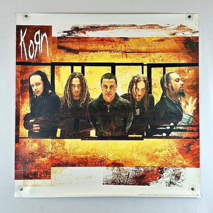 Poster of a band with a textured orange and brown background