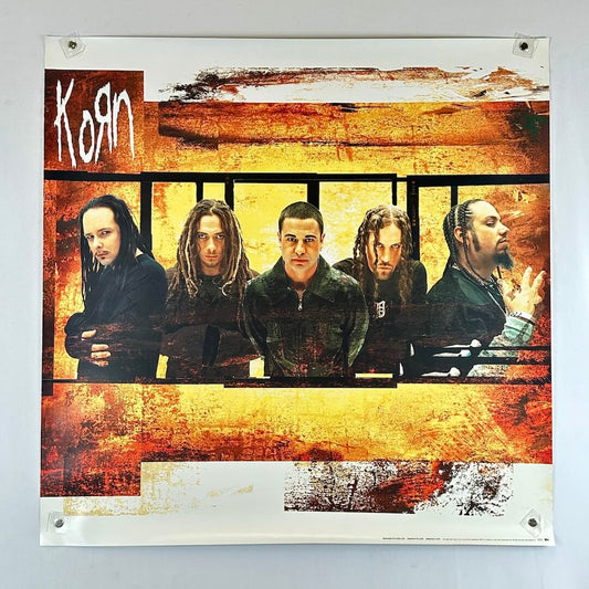 Poster of a band with a textured orange and brown background