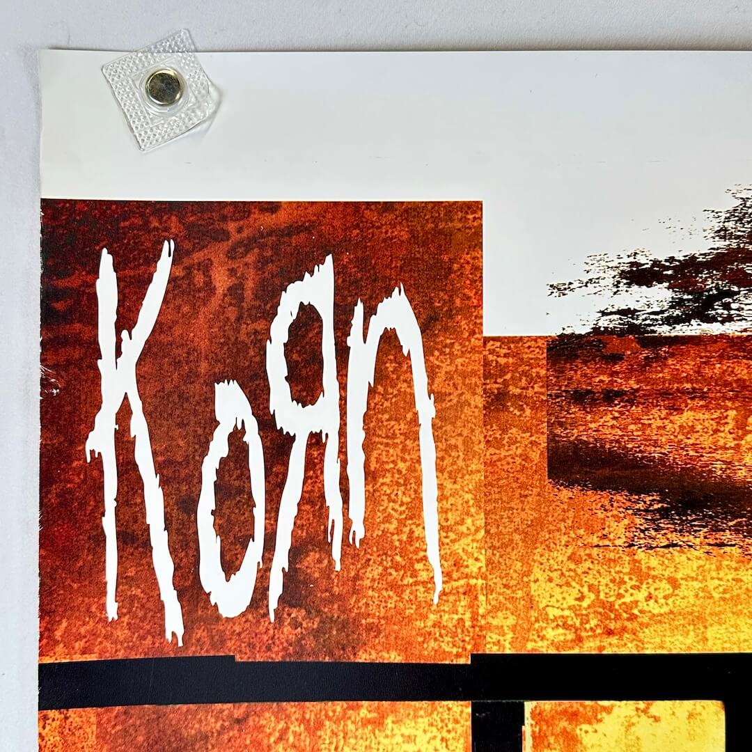 Top left corner of poster with some edge wear 