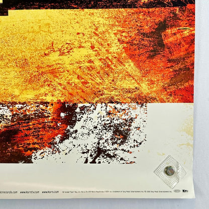 Bottom right corner with some edge wear and copyright information.