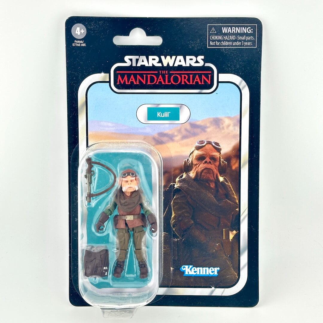 Star Wars The Mandalorian Kuiil action figure in its original packaging, featuring Kenner branding.
