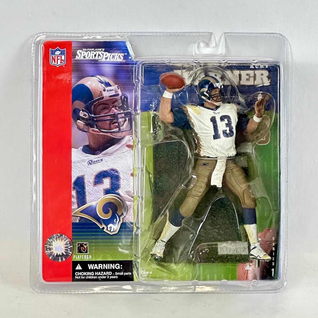 Action figure in packaging with NFL branding