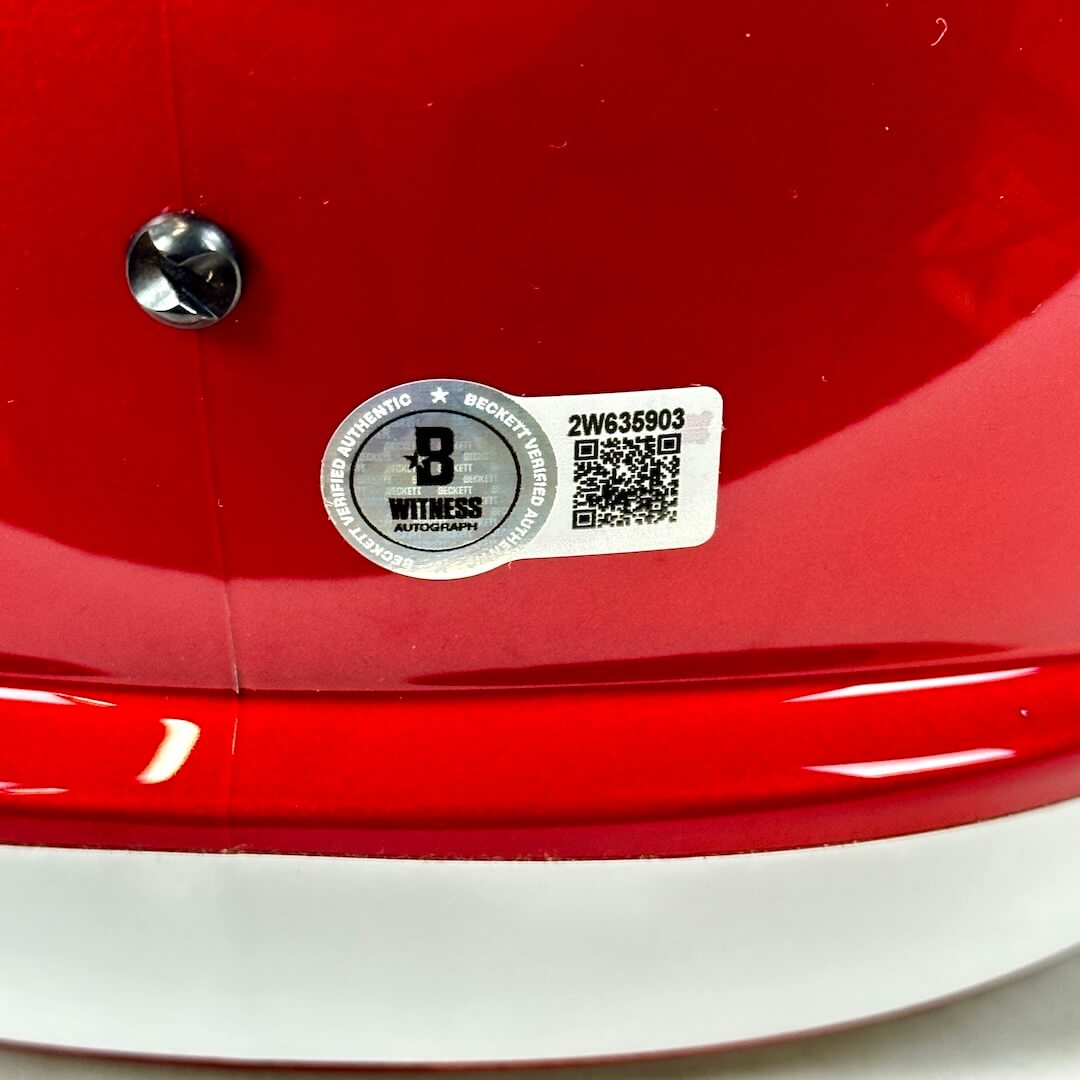 Close-up of authentication sticker with QR code and serial number. 
