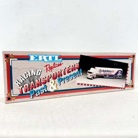 Model truck in a display case with 'ERTL Racing Transporters' packaging on a white background