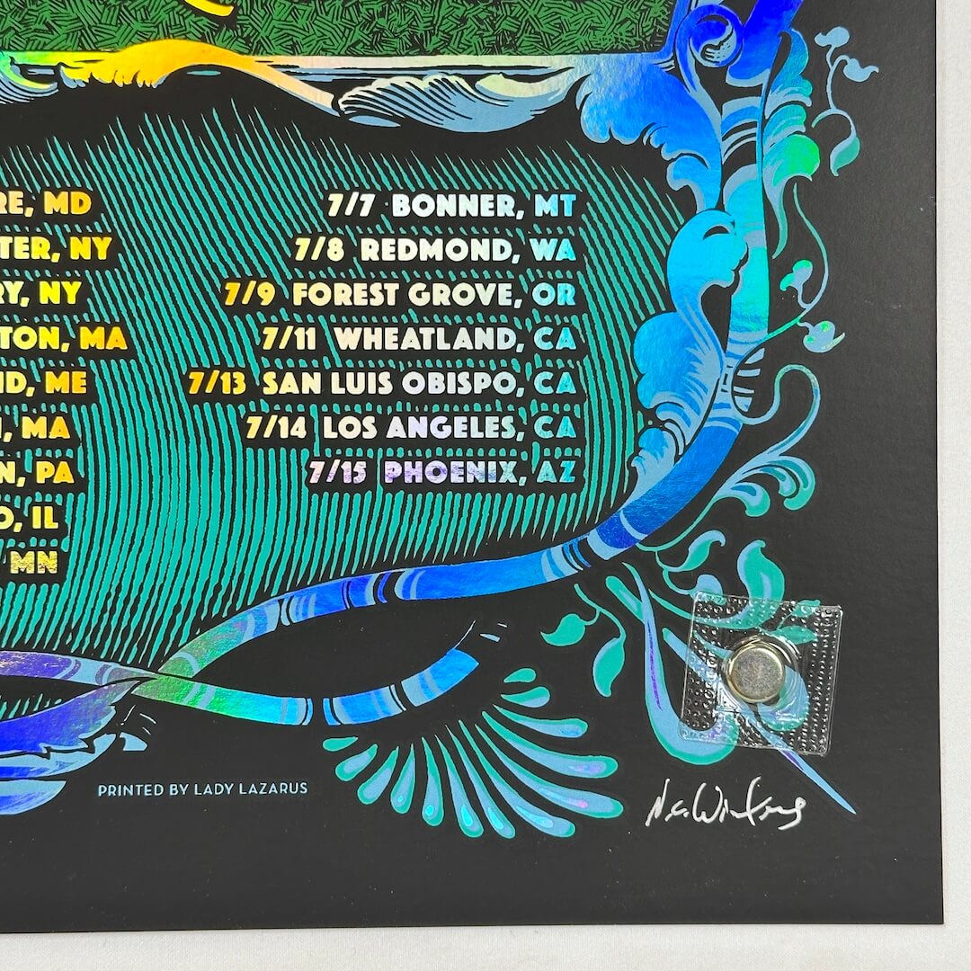 Bottom right corner featuring artist signature in silver. 