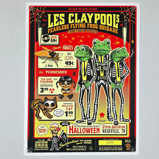 Promotional poster for Les Claypool's Fearless Flying Frog Brigade with frogs in skeleton costumes on a red background.