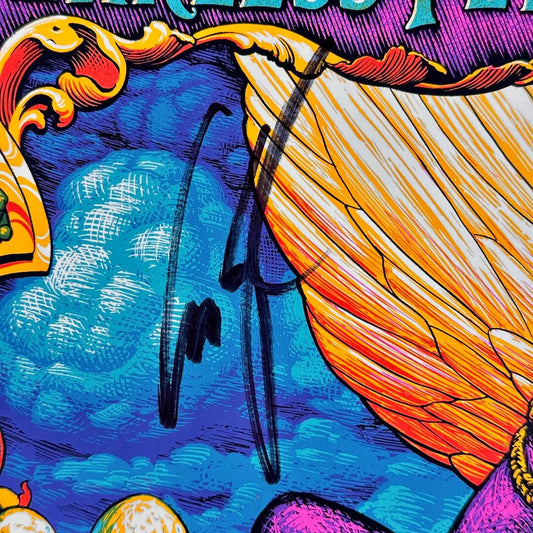 Close-up of Les Claypool's signature in black marker by frog's left wing. 