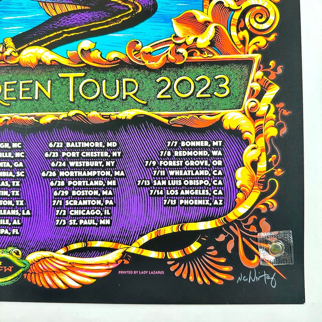 Bottom right corner of poster with artist signature in white by corner. 