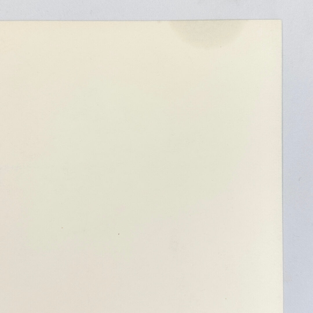 Close-up of gas stain on reverse side, less than two inches wide. 