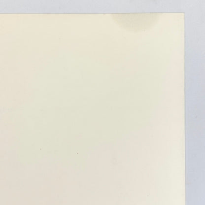 Close-up of gas stain on reverse side, less than two inches wide. 