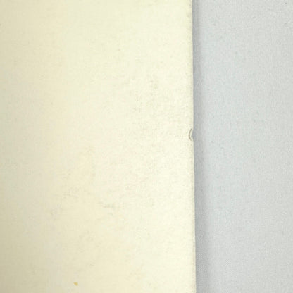 Small dent/notch in side of poster. 