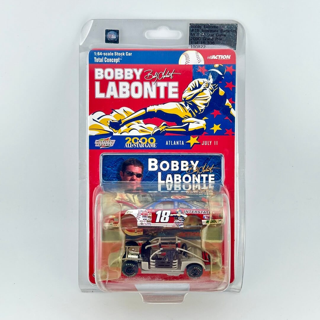 A packaged 1:48 scale die-cast model car of Bobby Labonte's 'Total Concept' race car, shown in its original blister pack.