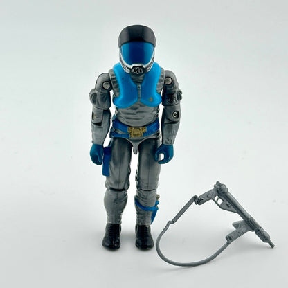 Action figure in a blue and gray suit with a weapon on a white background