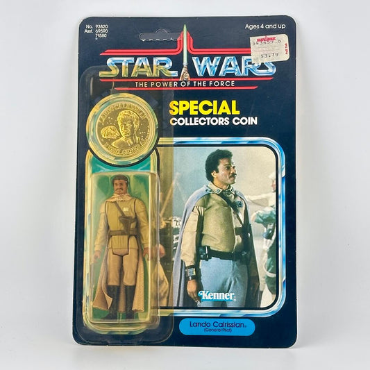 Star Wars action figure and coin packaging with Lando Calrissian on a white background