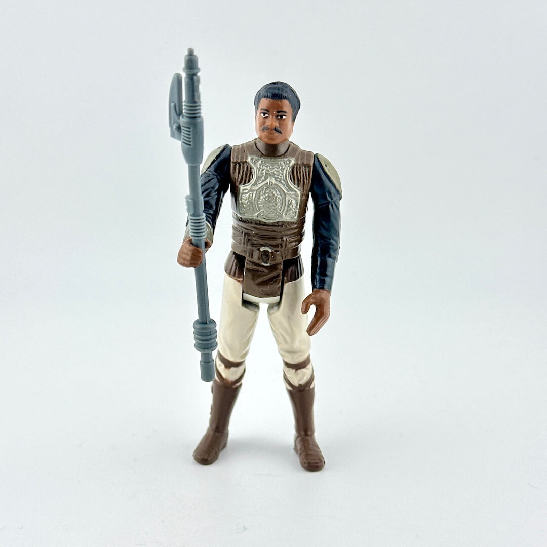 Action figure of a character from a science fiction franchise on a white background