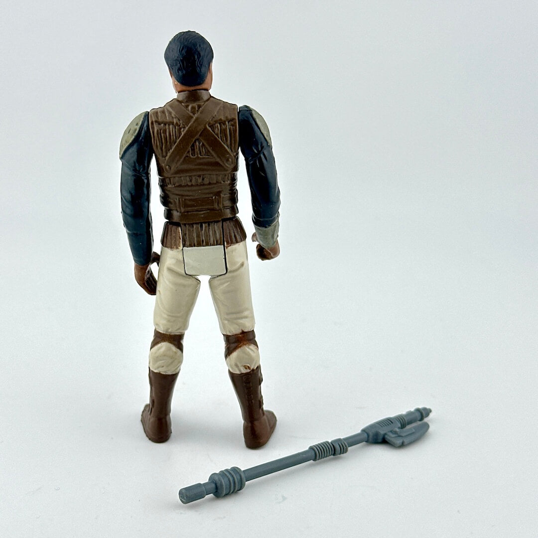 Action figure with a weapon on a white background
