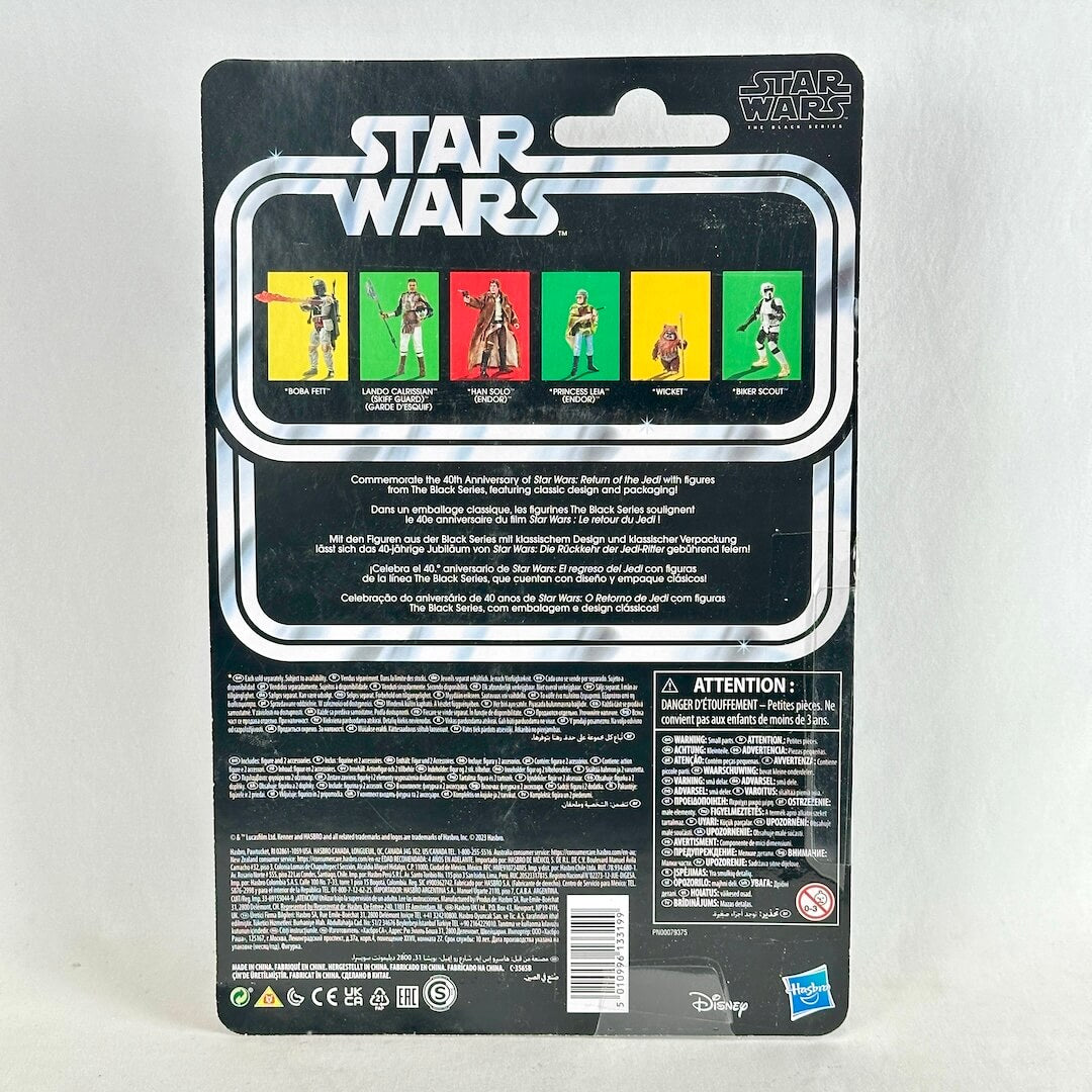 Action figure back card packaging, featuring the Star Wars logo, character images, and product information.