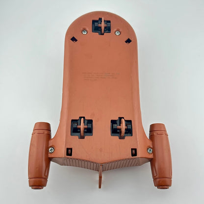 Back view of a brown space vehicle  with wheels on a white background