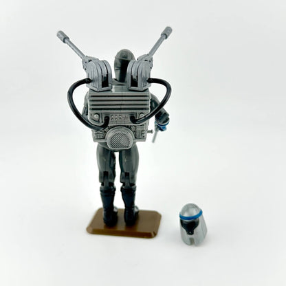 Toy figure with accessories against white background. 