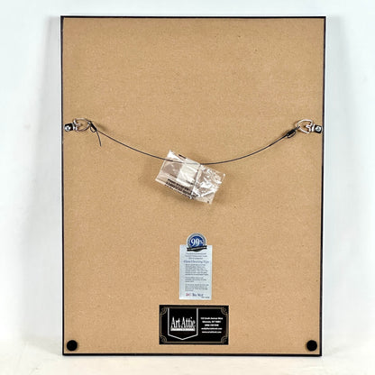 Backside of frame showing framer and care information. 