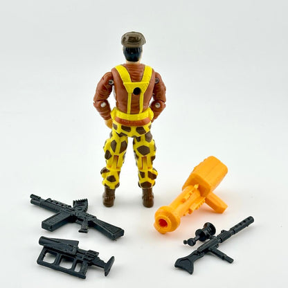 Toy figure in a brown and yellow outfit with accessories on a white background