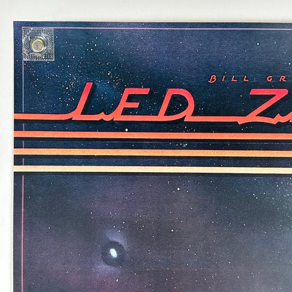 Top left corner of poster with no visible damage. 